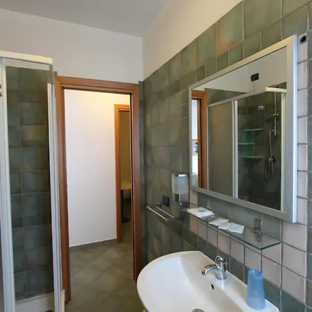 Lägenhetshotell Le Residenze Del Porto La Caletta